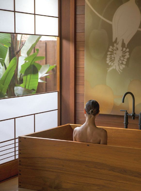 A wooden soaking tub is just one amenity in each of the 10 decked-out spa “hales,” or houses. RESORT PHOTO COURTESY OF SENSEI LANAI, A FOUR SEASONS RESORT