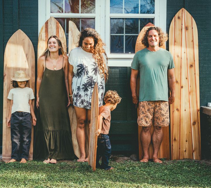 The Lloyd family with its first collection of boards PHOTO BY IKAIKA PIDOT PHOTOGRAPHY