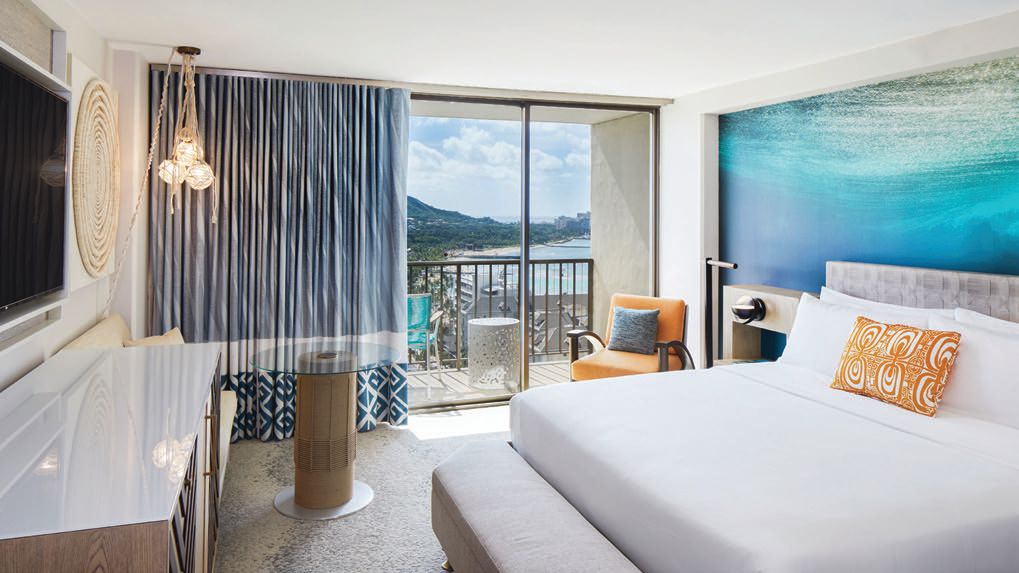 A guest room at Waikiki Beachcomber by Outrigg er with ocean views PHOTO COURTESY OF BRANDS