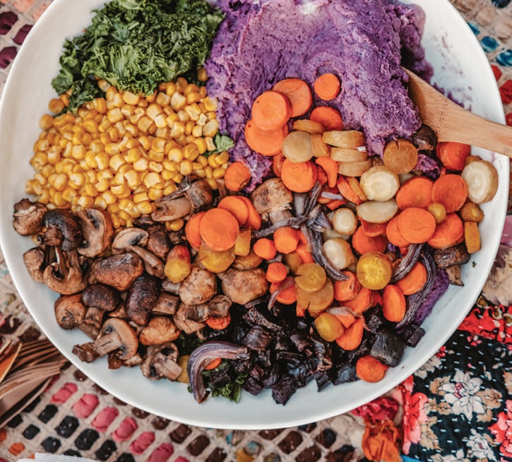 Multivitamin bowl with purple sweet potatoes, roasted beet, carrots, sauteed mushrooms, kale and sweet corn. PHOTO BY @MAZA.TRAVEL